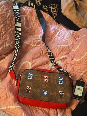 Karl Lagerfeld Brown Monogram Crossbody with Red Trim and Black-White Logo Strap